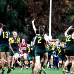 Spectators storm the field after the closing siren